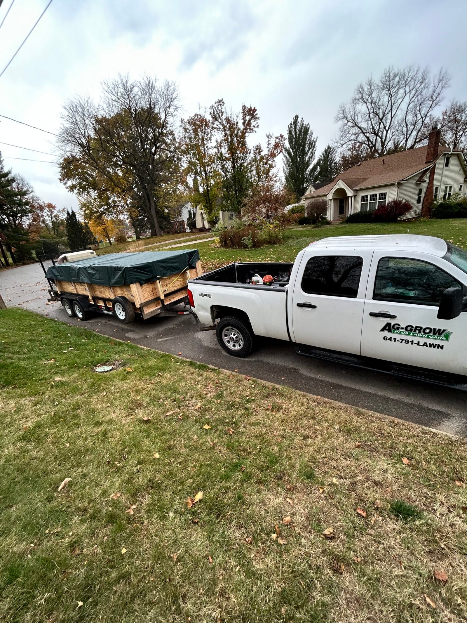 Professional fall leaf removal service by Ag-Grow Plus in Newton Iowa