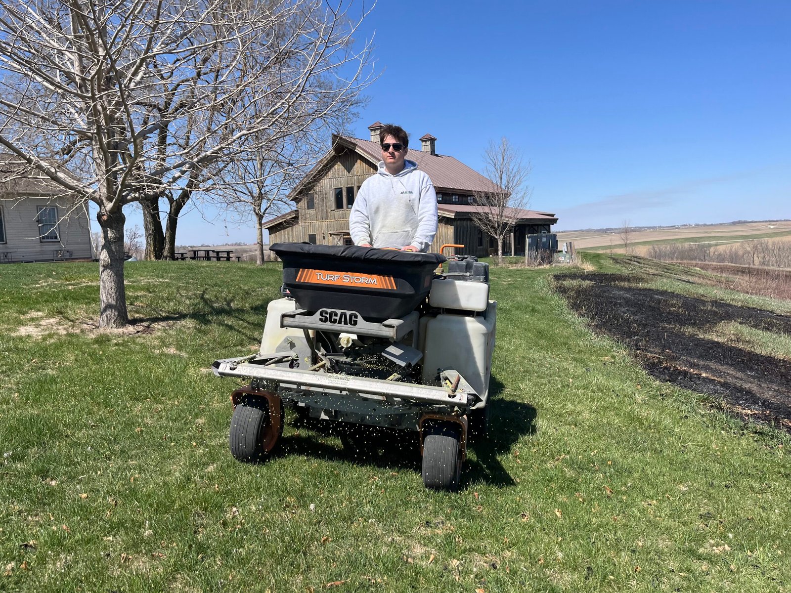 Professional lawn fertilizer application by Ag-Grow Plus in Newton Iowa